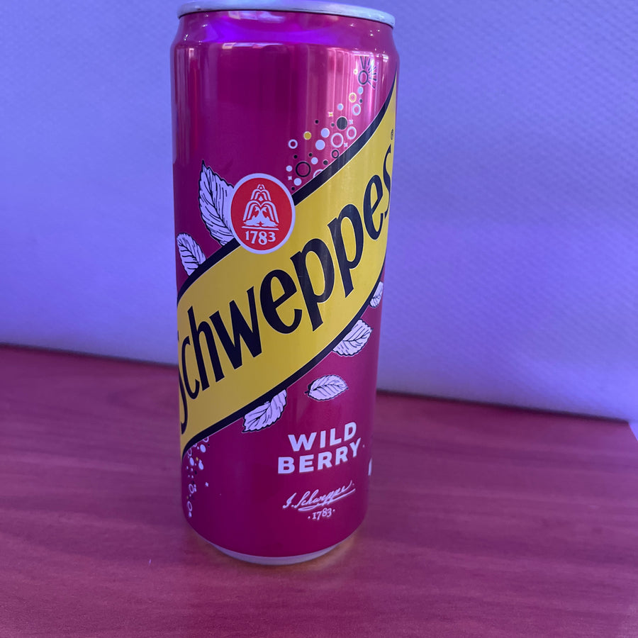 Schweppes Wild Berry (Poland, 330 ml) — front of pack at Exotic Snaxx Chicago