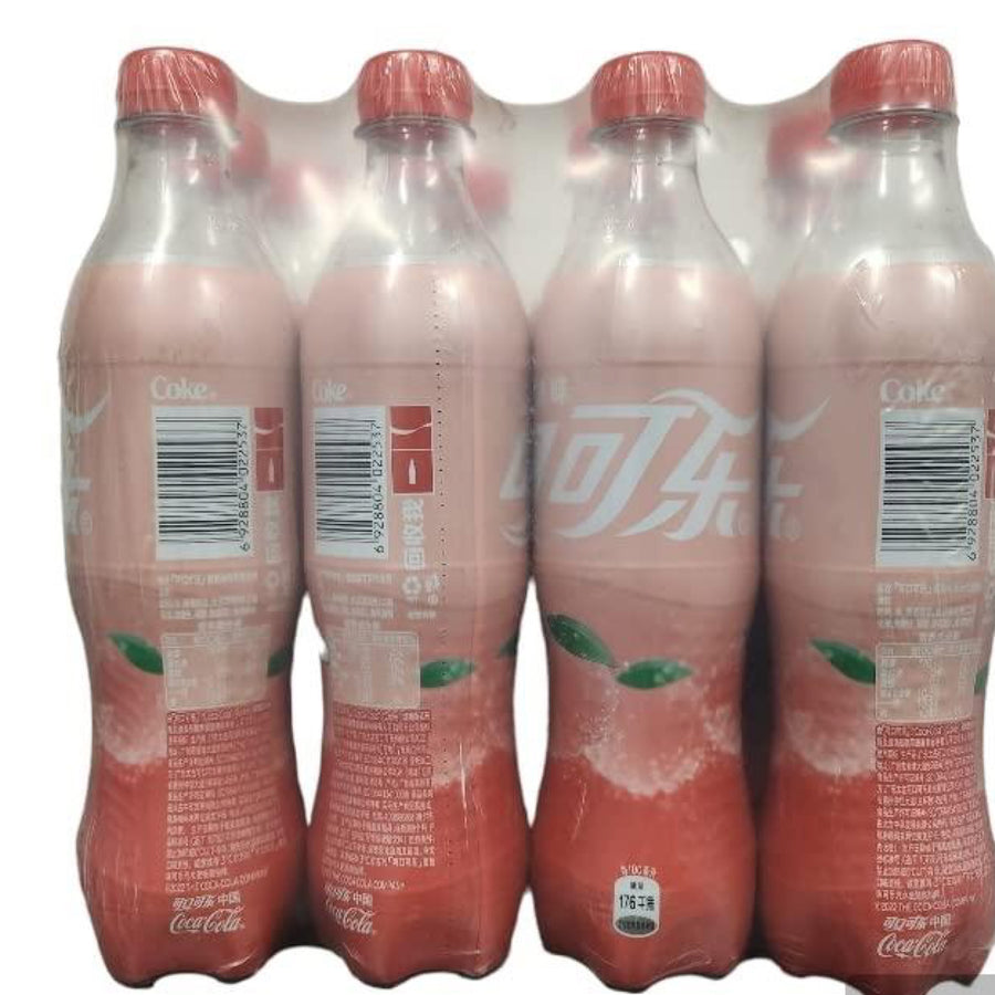 Coca Cola Peach Flavored Soft Drink 500 ml Each bottle (6) — front of pack at Exotic Snaxx Chicago