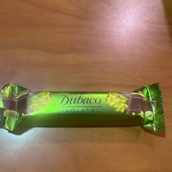 Shelf of Dubai chocolate bars from Turkish makers Carians, Bolci and Miskets in stock at Exotic Snaxx, 4226 N Harlem Ave, Harwood Heights IL