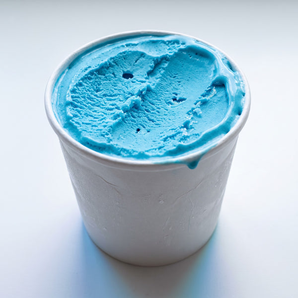 Blue Island blue raspberry flavored ice cream in a tub