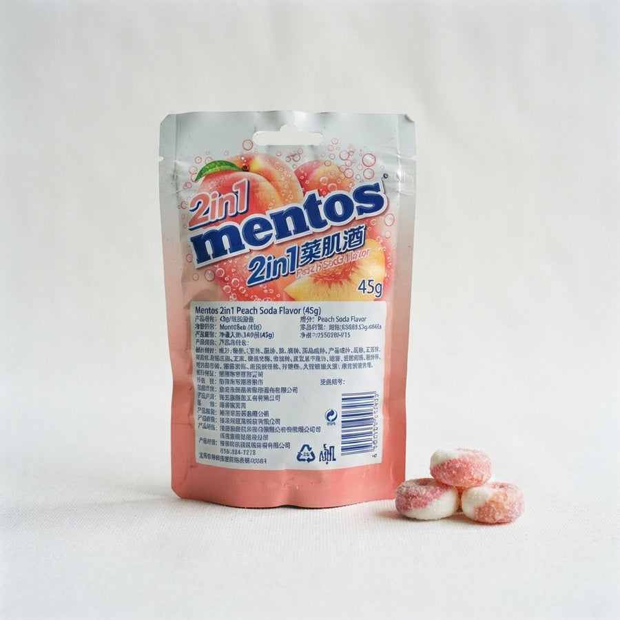 Mentos 2in1 Peach Soda Flavor (45g) — front of pack at Exotic Snaxx Chicago