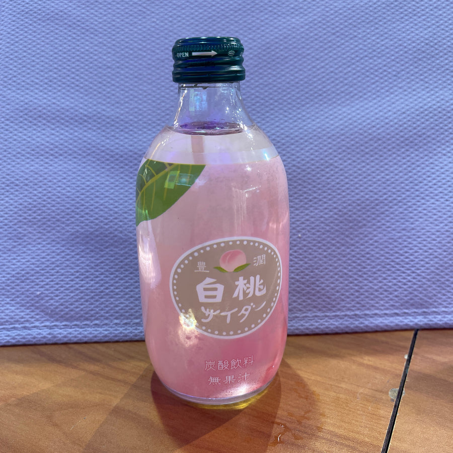 Tomomasu White Peach Cider — front of pack at Exotic Snaxx Chicago