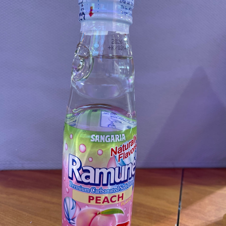 Ramune Soda – Peach 200 mL (Product of Japan) — front of pack at Exotic Snaxx Chicago