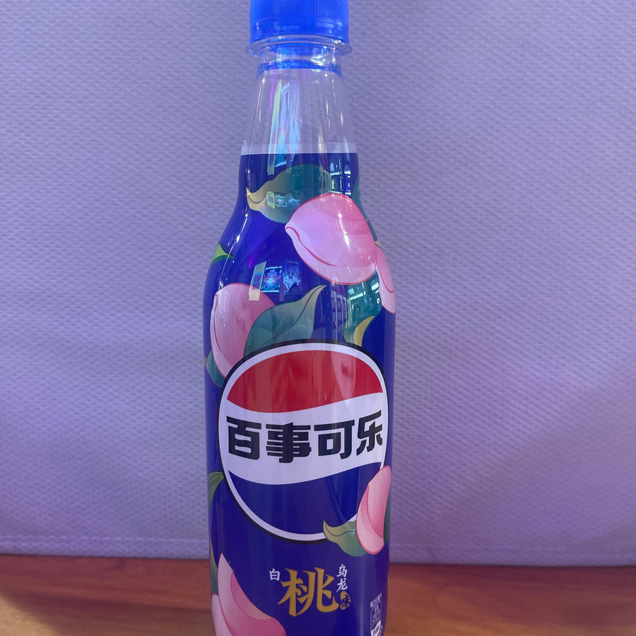 Pepsi Oolong White Peach (China, 500 ml) — front of pack at Exotic Snaxx Chicago