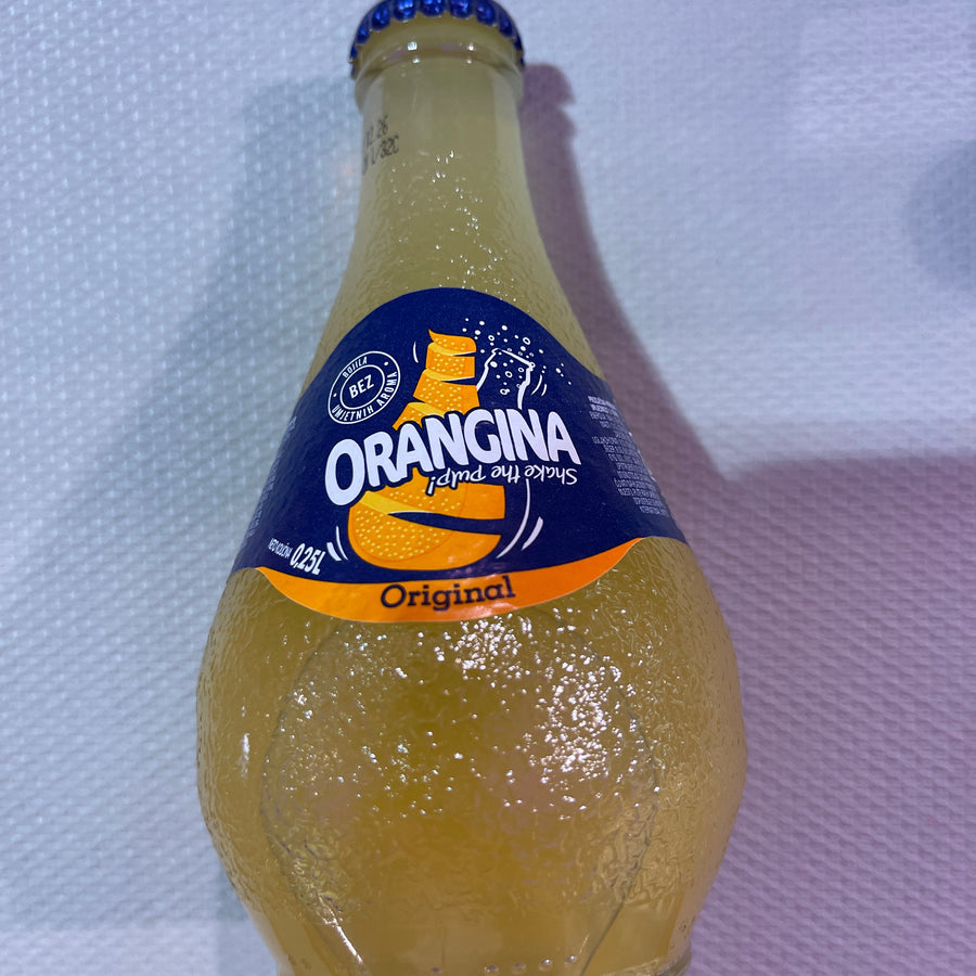 Orangina Carbonated Orange Drink(Bosna ) — front of pack at Exotic Snaxx Chicago